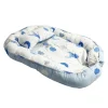 Babynest mit Kissen in Turkis