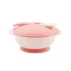 Kinderschüssel mit Löffel in rosa