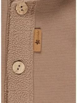 Overall in sand