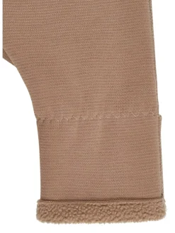 Overall in sand