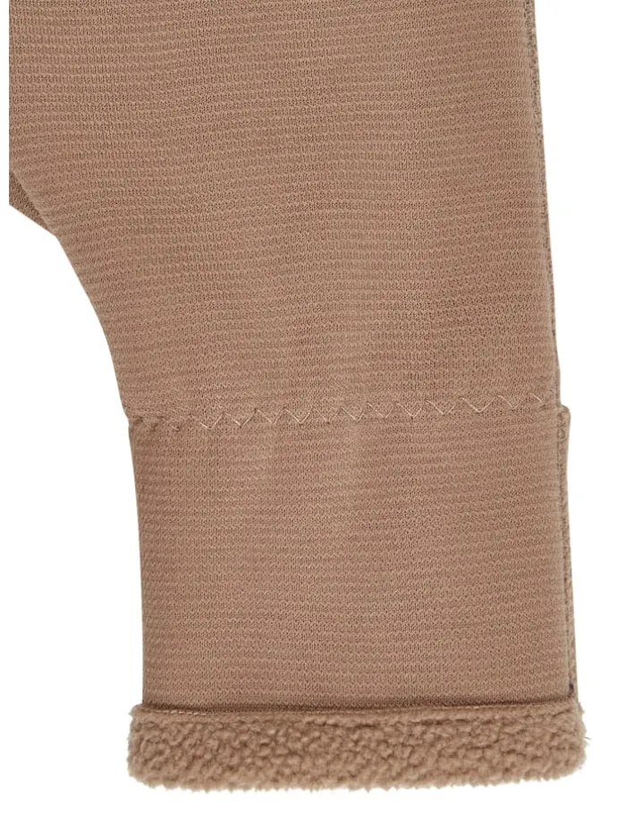 Overall in sand